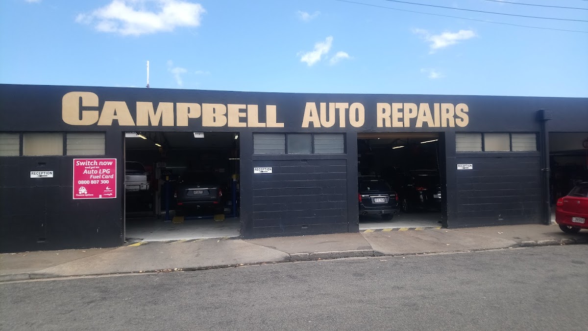 Front of the Campbells Auto Repairs building with open service bays